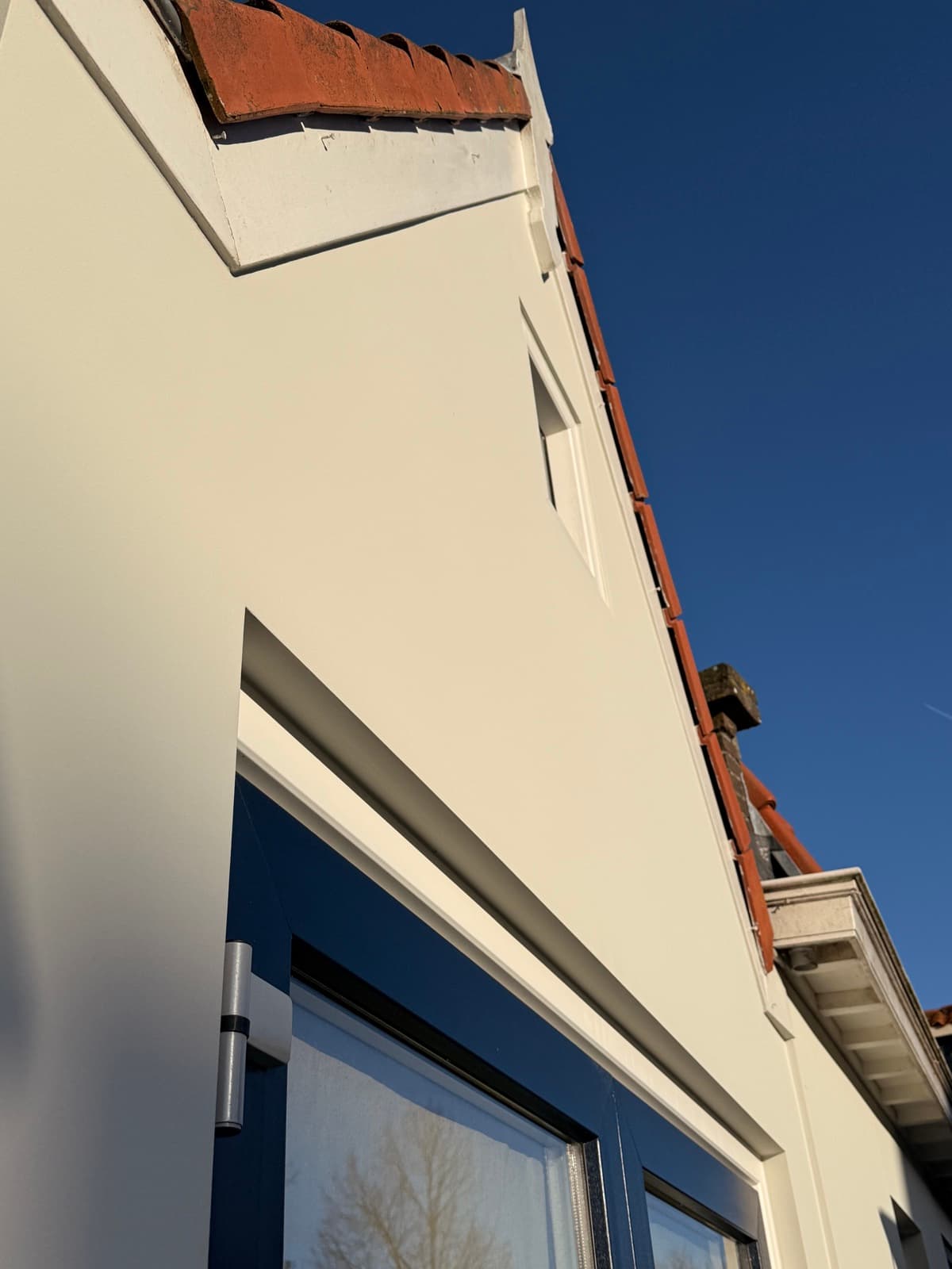 Buitenstucwerk project — modern glad gevelstucwerk